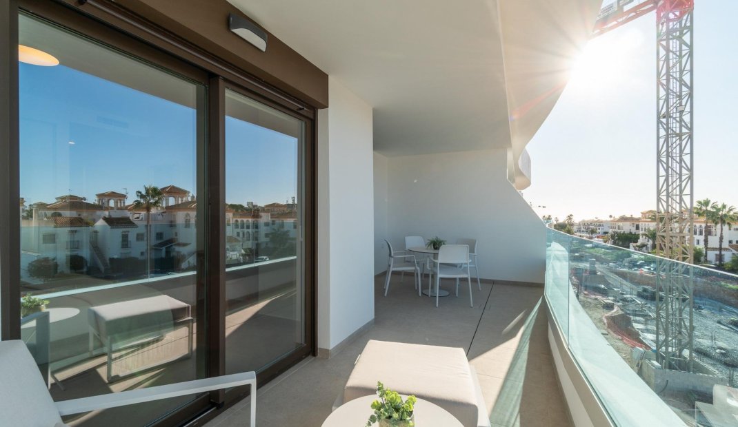Obra nueva - Apartamento -
Orihuela Costa - Playa Flamenca