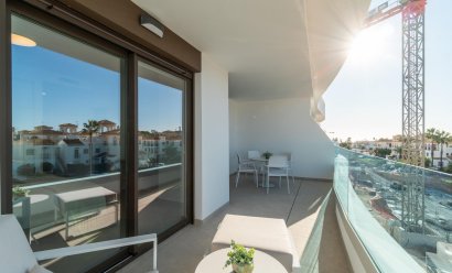 Obra nueva - Apartamento -
Orihuela Costa - Playa Flamenca