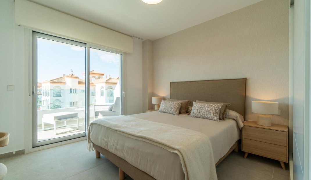 Obra nueva - Apartamento -
Orihuela Costa - Playa Flamenca