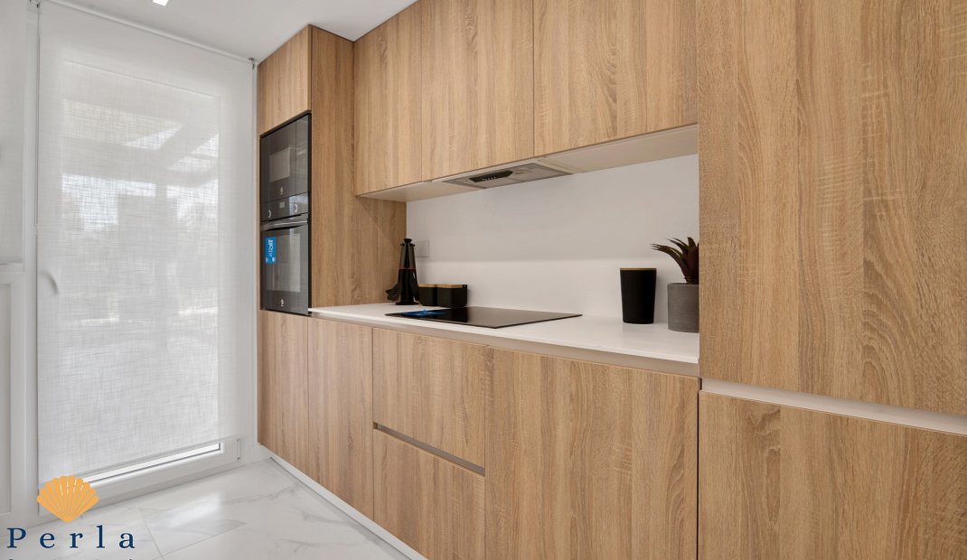 Obra nueva - Apartamento -
Punta Prima